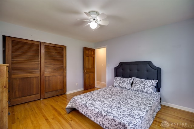 200 S Village, Washington Twp, OH 45459 - bedroom featuring a closet, baseboards, light wood-style floors, and ceiling fan
