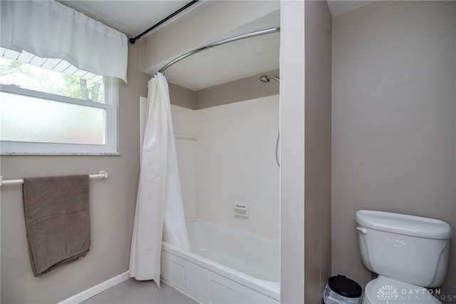 200 S Village, Washington Twp, OH 45459 - bathroom with shower / tub combo, toilet, baseboards, and tile patterned flooring