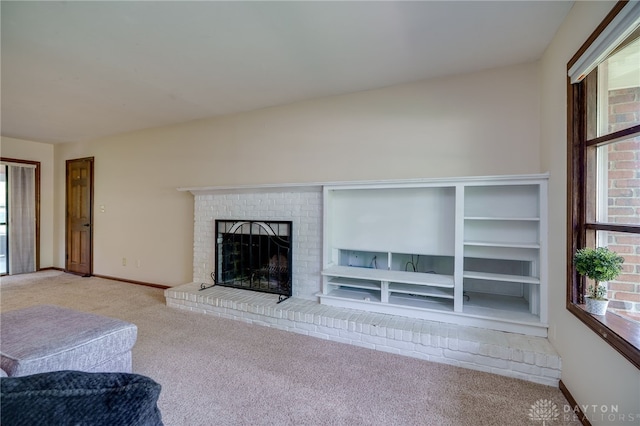 200 S Village, Washington Twp, OH 45459 - unfurnished living room with carpet flooring, a fireplace, and baseboards
