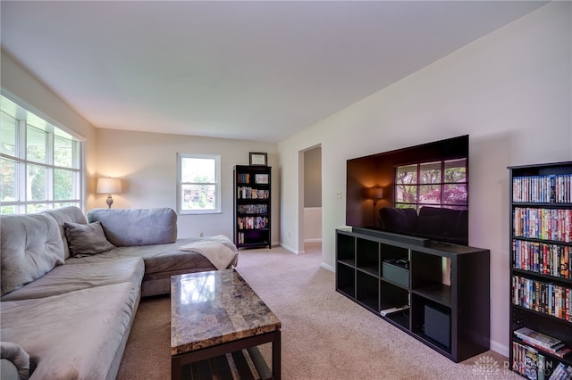 200 S Village, Washington Twp, OH 45459 - carpeted living area with healthy amount of natural light and baseboards