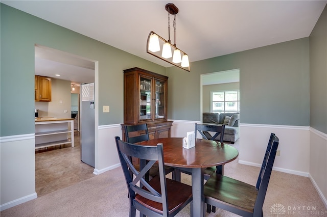 200 S Village, Washington Twp, OH 45459 - dining space with light colored carpet and baseboards