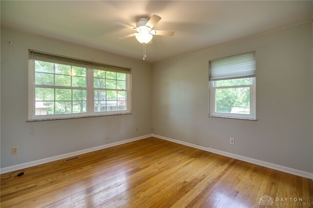 200 S Village, Washington Twp, OH 45459 - spare room featuring baseboards, light wood-style flooring, and a ceiling fan