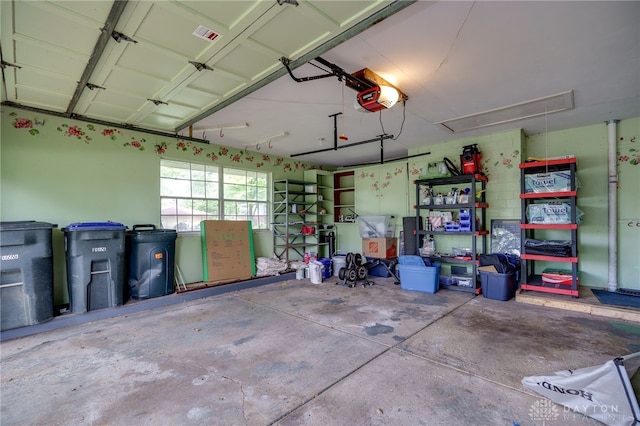 200 S Village, Washington Twp, OH 45459 - garage featuring a garage door opener