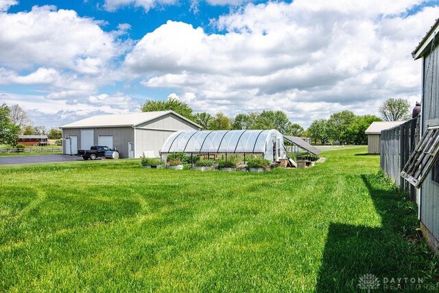 2774 N Law Rd, Oxford, OH 45056 - view of green lawn featuring an outbuilding, a garage, and an exterior structure