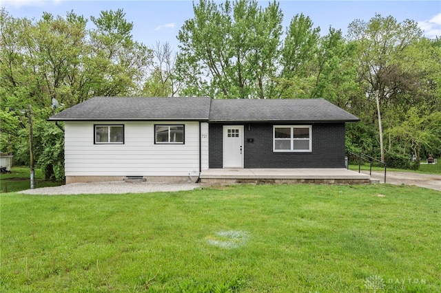 ranch-style home with a front yard