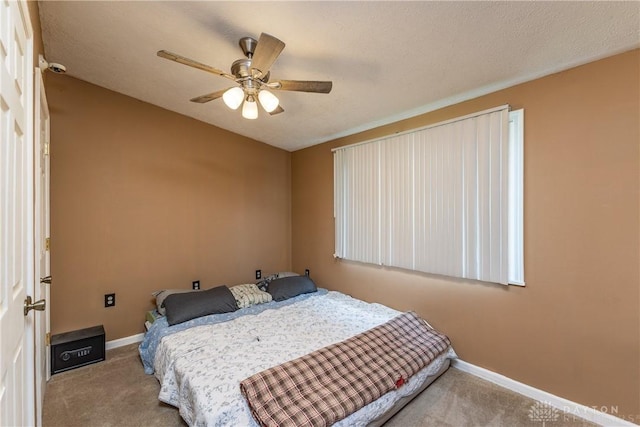 175 S Walnut St, Germantown, OH 45327 - carpeted bedroom with baseboards and a ceiling fan