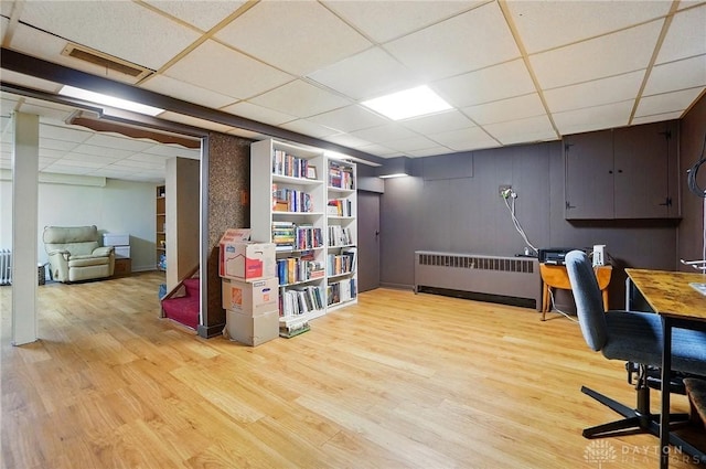 4207 Morningside Blvd, Dayton, OH 45432 - office area featuring radiator heating unit, a drop ceiling, and light wood-type flooring