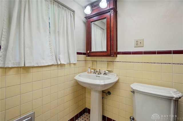 4207 Morningside Blvd, Dayton, OH 45432 - bathroom featuring tile walls and toilet