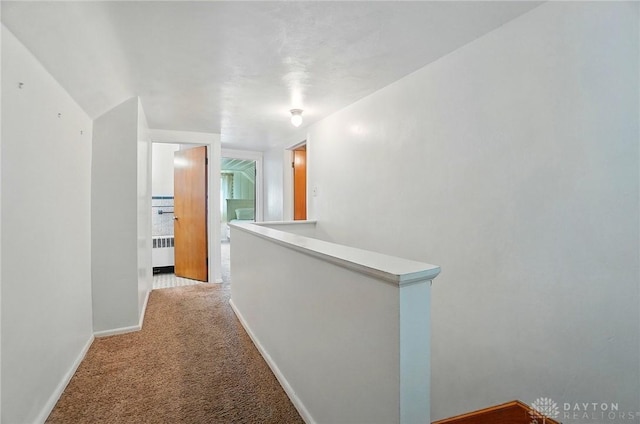 4207 Morningside Blvd, Dayton, OH 45432 - corridor with an upstairs landing, radiator, carpet floors, and baseboards