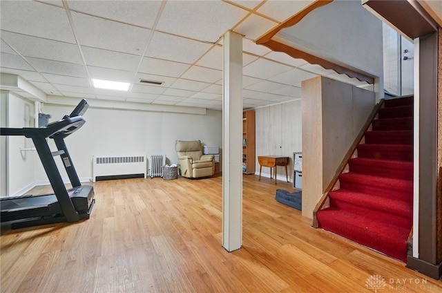 4207 Morningside Blvd, Dayton, OH 45432 - workout room with radiator heating unit, wood finished floors, and a drop ceiling