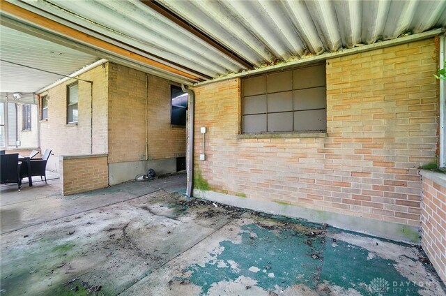 4207 Morningside Blvd, Dayton, OH 45432 - view of property exterior featuring a patio and brick siding