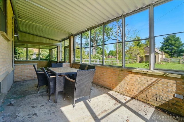 4207 Morningside Blvd, Dayton, OH 45432 - sunroom featuring outdoor dining space and vaulted ceiling
