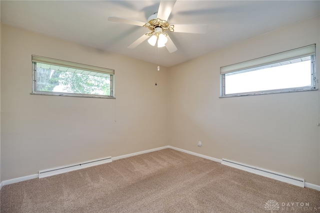 4231 Maricarr Dr, Dayton, OH 45429 - carpeted spare room featuring a baseboard radiator, a baseboard heating unit, plenty of natural light, and baseboards
