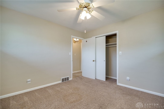 4231 Maricarr Dr, Dayton, OH 45429 - unfurnished bedroom with carpet flooring, a closet, baseboards, and a ceiling fan