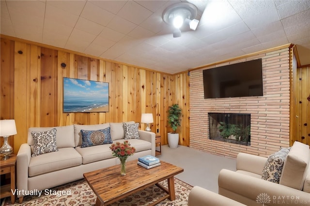 4231 Maricarr Dr, Dayton, OH 45429 - living room with wooden walls and a fireplace