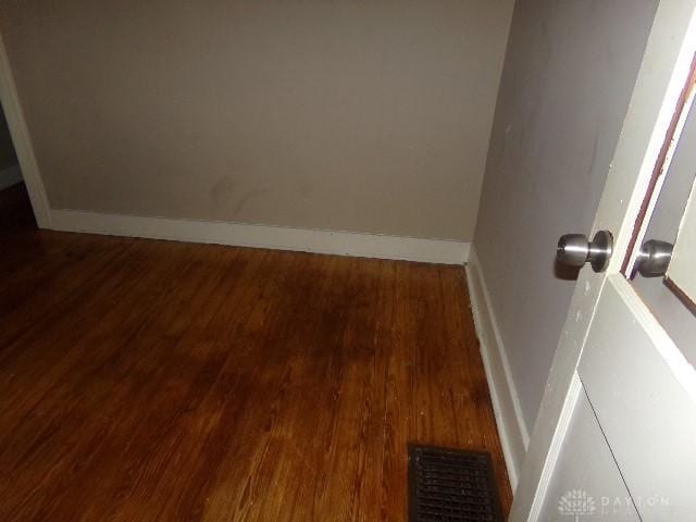 1719 Lamberton St, Middletown, OH 45044 - unfurnished room with wood finished floors and baseboards