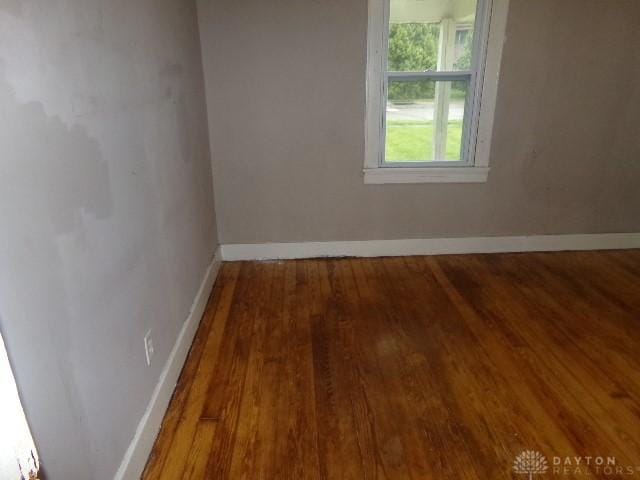 1719 Lamberton St, Middletown, OH 45044 - empty room with wood finished floors and baseboards