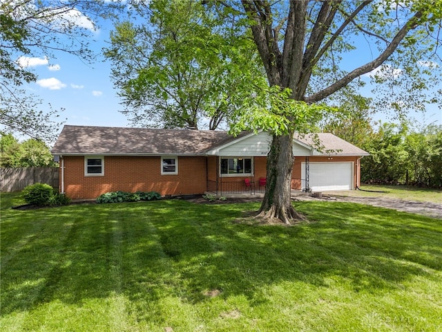 view of front of property featuring brick siding, a garage, and dirt driveway