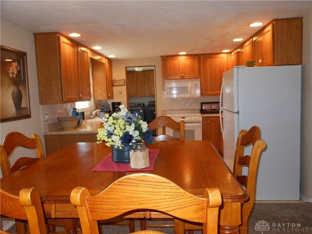 8189 Oakes Rd, Arcanum, OH 45304 - dining room with washing machine and clothes dryer, recessed lighting, and baseboards