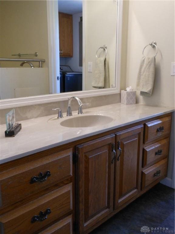 8189 Oakes Rd, Arcanum, OH 45304 - bathroom with washer / clothes dryer and vanity