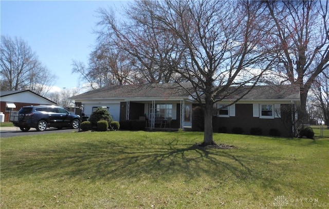 8189 Oakes Rd, Arcanum, OH 45304 - ranch-style home featuring a front yard