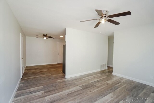 9738 Gibralter Dr, Colerain Township, OH 45251 - spare room featuring a ceiling fan, wood finished floors, and baseboards