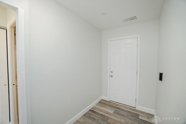 9738 Gibralter Dr, Colerain Township, OH 45251 - doorway to outside featuring wood finished floors and baseboards
