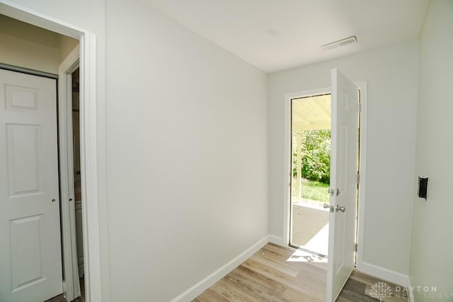 9738 Gibralter Dr, Colerain Township, OH 45251 - doorway to outside with baseboards and light wood-style flooring