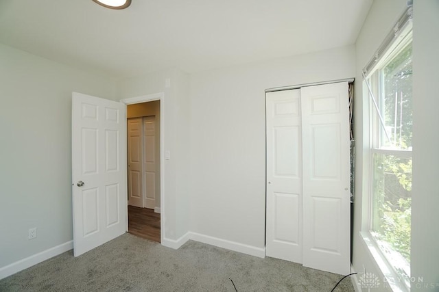 9738 Gibralter Dr, Colerain Township, OH 45251 - unfurnished bedroom with carpet floors, baseboards, and a closet