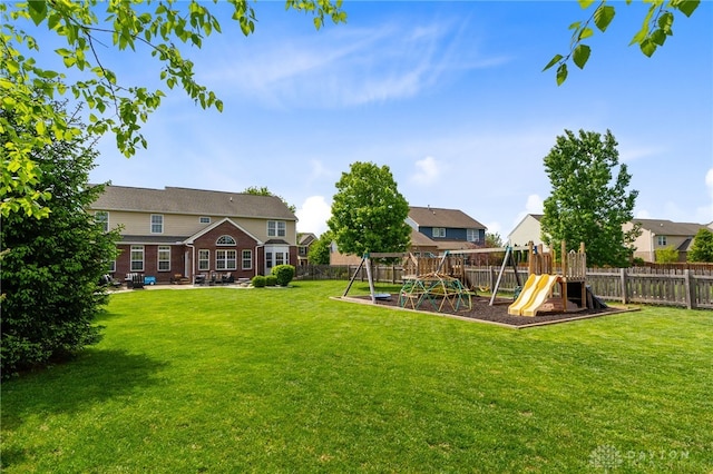 9378 Oak Brook Dr, Clearcreek Twp, OH 45458 - view of yard with a playground and a patio area