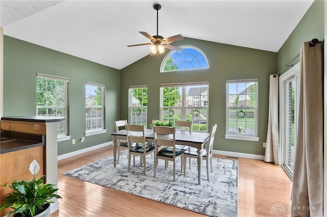 9378 Oak Brook Dr, Clearcreek Twp, OH 45458 - dining room featuring lofted ceiling, ceiling fan, light wood-style floors, and healthy amount of natural light