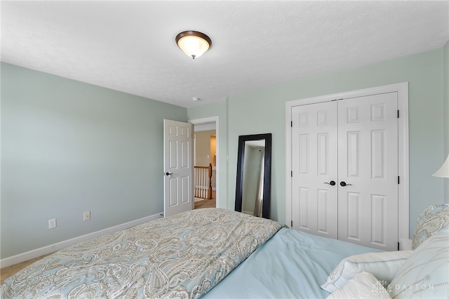 9378 Oak Brook Dr, Clearcreek Twp, OH 45458 - carpeted bedroom featuring a closet and baseboards