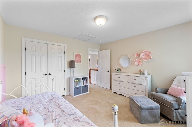 9378 Oak Brook Dr, Clearcreek Twp, OH 45458 - bedroom featuring light carpet, a closet, and attic access