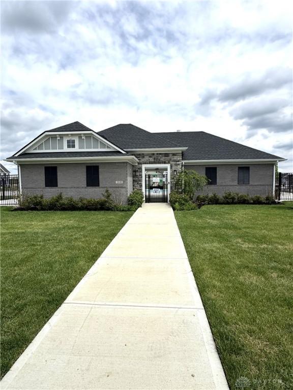 2170 David Grey Cir, Beavercreek, OH 45434 - view of front of property featuring a gate, roof with shingles, and brick siding