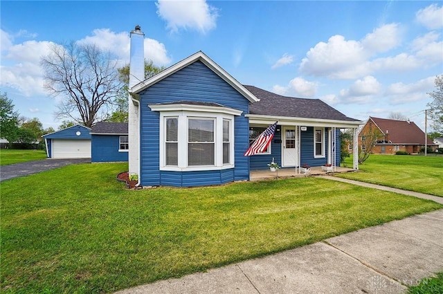 bungalow with a front lawn, a garage, a chimney, a shingled roof, and a porch