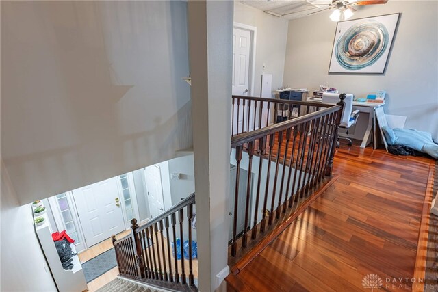 2540 Greenside Dr, Beavercreek, OH 45431 - staircase with wood finished floors and a ceiling fan