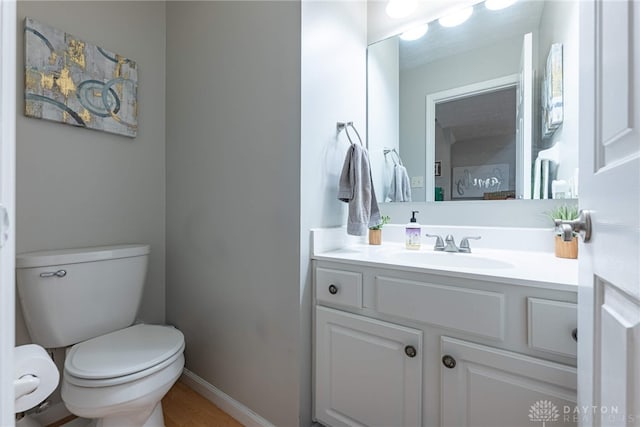 2540 Greenside Dr, Beavercreek, OH 45431 - bathroom with vanity, toilet, and baseboards
