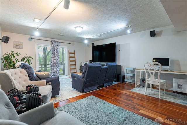 2540 Greenside Dr, Beavercreek, OH 45431 - living area with track lighting, wood finished floors, and a textured ceiling