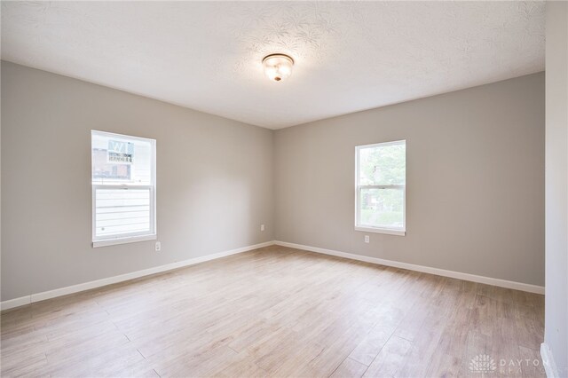 18241826 W Grand Ave, Dayton, OH 45402 - empty room featuring light wood-type flooring and baseboards
