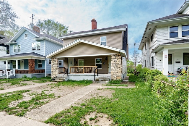 18241826 W Grand Ave, Dayton, OH 45402 - american foursquare style home with a porch, stone siding, and a chimney
