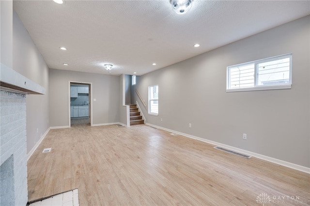 18241826 W Grand Ave, Dayton, OH 45402 - below grade area with stairs, light wood finished floors, recessed lighting, and baseboards