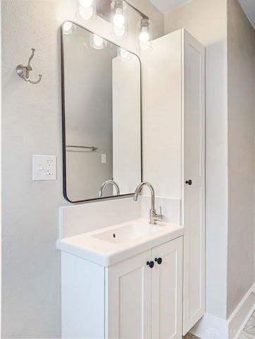 244 Windsor Ave, Urbana, OH 43078 - bathroom featuring vanity and baseboards
