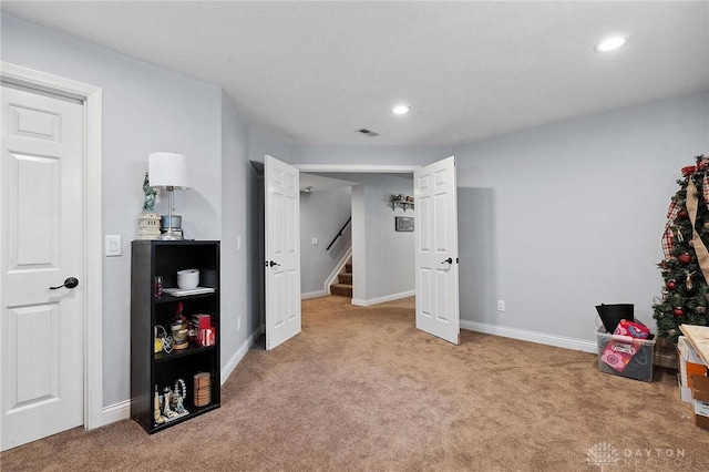 carpeted bedroom with recessed lighting and baseboards
