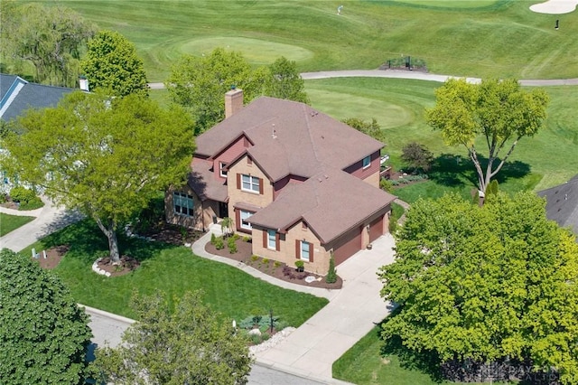view from above of property with a golf course
