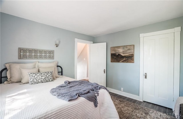 221 Virginia Ave, Dayton, OH 45410 - bedroom with dark wood-style flooring and baseboards