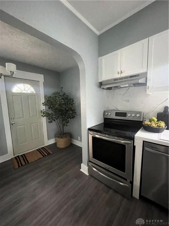 221 Virginia Ave, Dayton, OH 45410 - kitchen featuring electric range, under cabinet range hood, white cabinets, arched walkways, and crown molding
