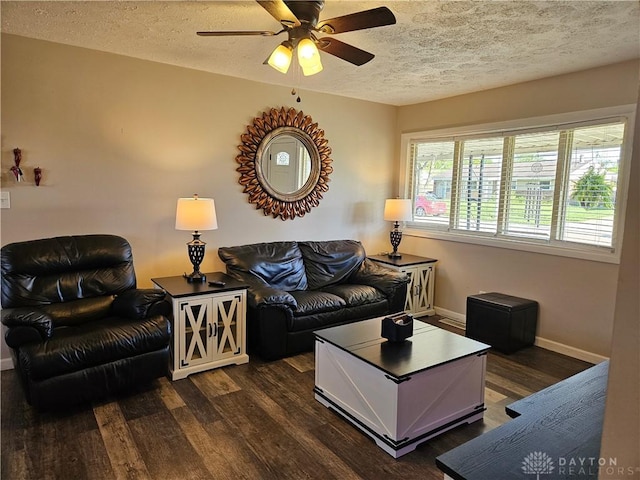 5107 Christy Ave, Dayton, OH 45431 - living room featuring a textured ceiling, dark wood-style floors, baseboards, and ceiling fan