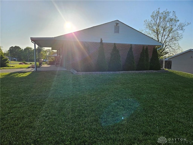 5107 Christy Ave, Dayton, OH 45431 - rear view of house featuring a lawn and a patio area