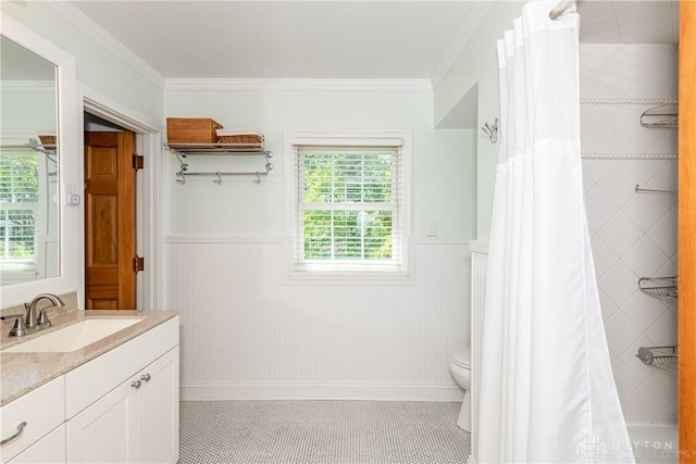 135 E Dixon Ave, Oakwood, OH 45419 - full bath featuring a wainscoted wall, crown molding, vanity, toilet, and tile patterned flooring