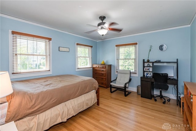 135 E Dixon Ave, Oakwood, OH 45419 - bedroom featuring crown molding, light wood-style floors, and ceiling fan